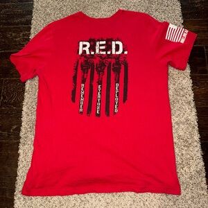 Nine line T-Shirt “RED REMEMBER EVERYONE DEPLOYED”stains, rips, and tears